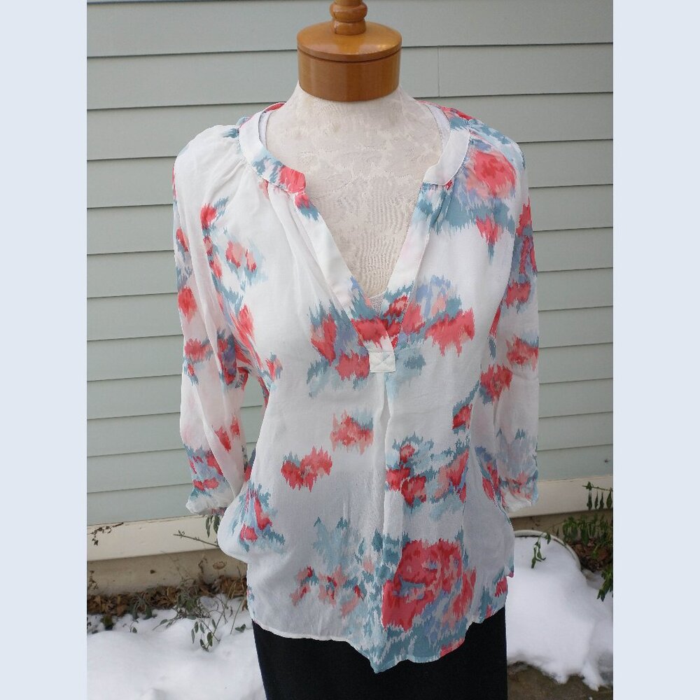 Blouse: Silk, patterned white, v-notch neck. Size medium - by Joie